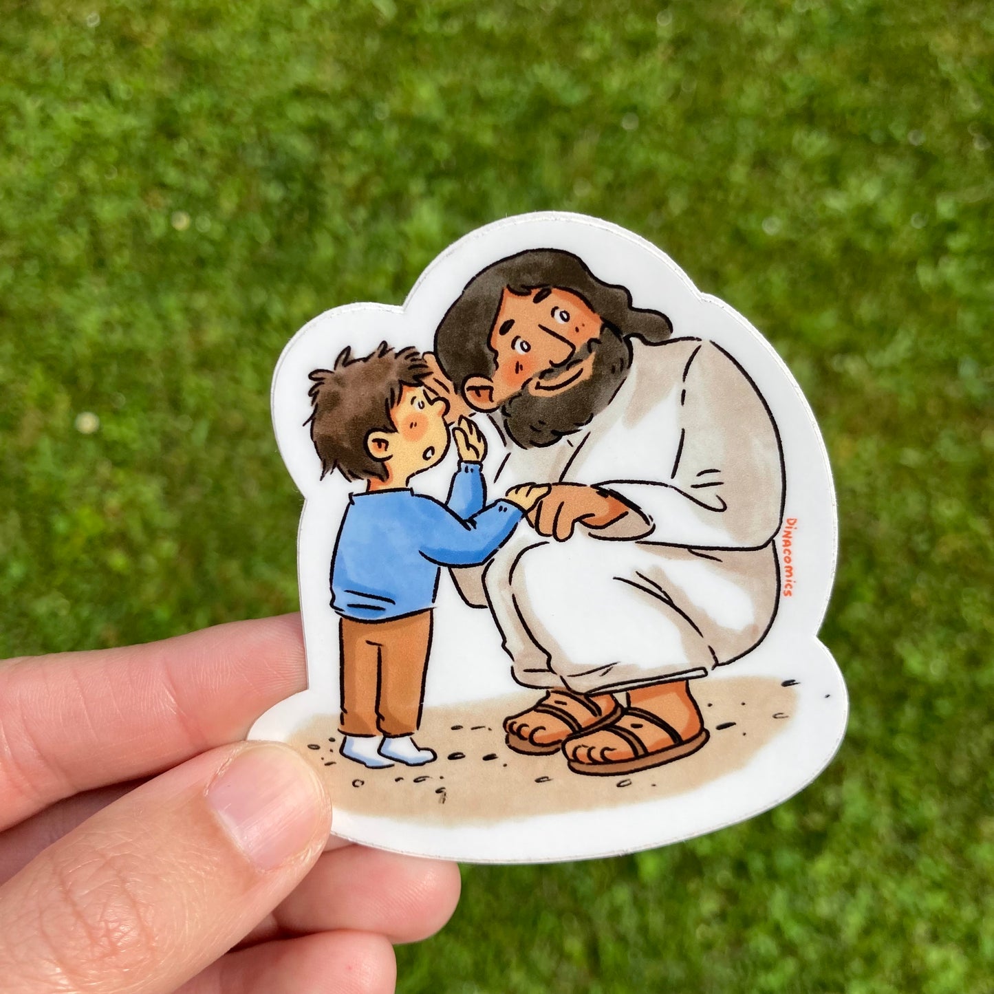 Adhesivo Jesús y niño hablando al oído secreto